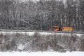 Snow removal winter service with a truck in the Salzkammergut Royalty Free Stock Photo