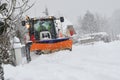 Snow removal winter service with a truck in the Salzkammergut