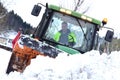 Snow removal winter service with a truck in the Salzkammergut Royalty Free Stock Photo