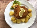 Schnitzel Cordon bleu is a breaded schnitzel stuffed with cheese and ham.