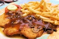 Schnitzel with muchroom sauce Royalty Free Stock Photo