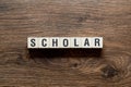 Scholar - word concept on building blocks, text Royalty Free Stock Photo