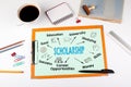 Scholarship Concept, keywords and icons. Office desk with stationery Royalty Free Stock Photo