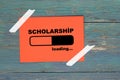 Scholarship loading on paper Royalty Free Stock Photo