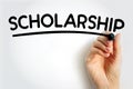 SCHOLARSHIP underlined text with marker, concept background