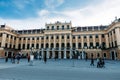 Schonbrunn Palace main building view with lots of tourists