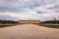 Schonbrunn Palace with people in front of it surrounded by vast gardens, Austria, Vienna, Schloss,