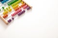 School abacus with colorful beads on white color background, close up view Royalty Free Stock Photo