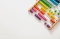 School abacus with colorful beads on white color background, close up view Royalty Free Stock Photo