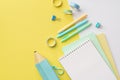 School accessories concept. Top view photo of blue pencil-case stack of copybooks colorful pens binder clips and adhesive tape on Royalty Free Stock Photo