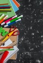 School accessories on a dark background. Top view Royalty Free Stock Photo