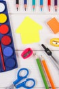 School accessories and shape of building on white boards, back to school concept Royalty Free Stock Photo