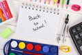 School accessories on white boards, back to school concept Royalty Free Stock Photo