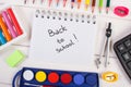 School accessories on white boards, back to school concept Royalty Free Stock Photo