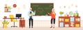 School adult female and male teachers at blackboards in classroom