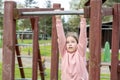 School age children two girls playing around on the playground, climbing, kids and fun physical exercise outdoors, sisters, Royalty Free Stock Photo