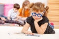 School aged girl reading a book Royalty Free Stock Photo