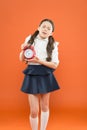 School alarm. Happy girl hold alarm clock counting for lunch time. School time. time to go to school. Children education Royalty Free Stock Photo