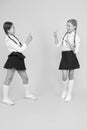 School application smartphone. School girls use smartphone to take photo. Girls school uniform. Personal blog. Dont give