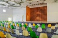 School assembly hall with stage for performance and rows of seats