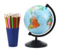 School background. Globe with colored pencils isolated on white background Royalty Free Stock Photo