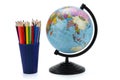 School background. Globe with colored pencils isolated on white background Royalty Free Stock Photo