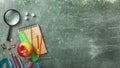 School background green chalkboard and stationery school tools, top view Royalty Free Stock Photo