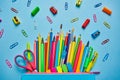 School background. Pencil case with bright office supplies Royalty Free Stock Photo