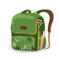 School backpack, green book bag with school supplies, ruler, books, art brush, pencil isolated on a white background Royalty Free Stock Photo