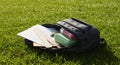 School Backpack Outdoors: Open Backpack with Supplies on Grass Royalty Free Stock Photo