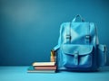 School backpack and textbooks on a background Royalty Free Stock Photo