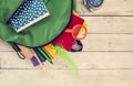 School backpack on wooden background Royalty Free Stock Photo