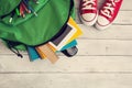 School backpack on wooden background Royalty Free Stock Photo