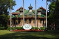 The school badge and school motto of Sun Yat-sen U