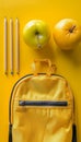 School bag essentials stationery supplies banner design for education on yellow background Royalty Free Stock Photo