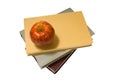 School books and apple