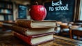 School books with apple on desk. Back to school Royalty Free Stock Photo