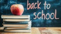 School books with apple on desk. Back to school Royalty Free Stock Photo