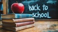 School books with apple on desk. Back to school Royalty Free Stock Photo