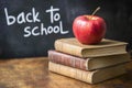 School books with apple on desk. Back to school Royalty Free Stock Photo