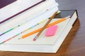 School books, stacked, with pencils Royalty Free Stock Photo