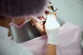 School boy at dental appointment. Close-up of oral cavity of a teenage boy sitting on dental chair while pediatric dentist Royalty Free Stock Photo