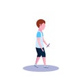 School boy profile isolated using smartphone male cartoon character full length flat