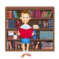 School boy reading a book and library Royalty Free Stock Photo