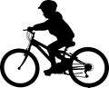 School boy riding MTB silhouette