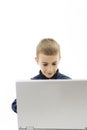 School boy sitting in front of the monitor laptop Royalty Free Stock Photo