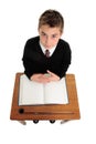 School boy sitting at school desk Royalty Free Stock Photo