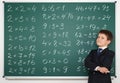School boy solve math on board Royalty Free Stock Photo