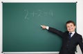 School boy solve math on school board Royalty Free Stock Photo