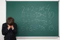 School boy solve math on school board Royalty Free Stock Photo